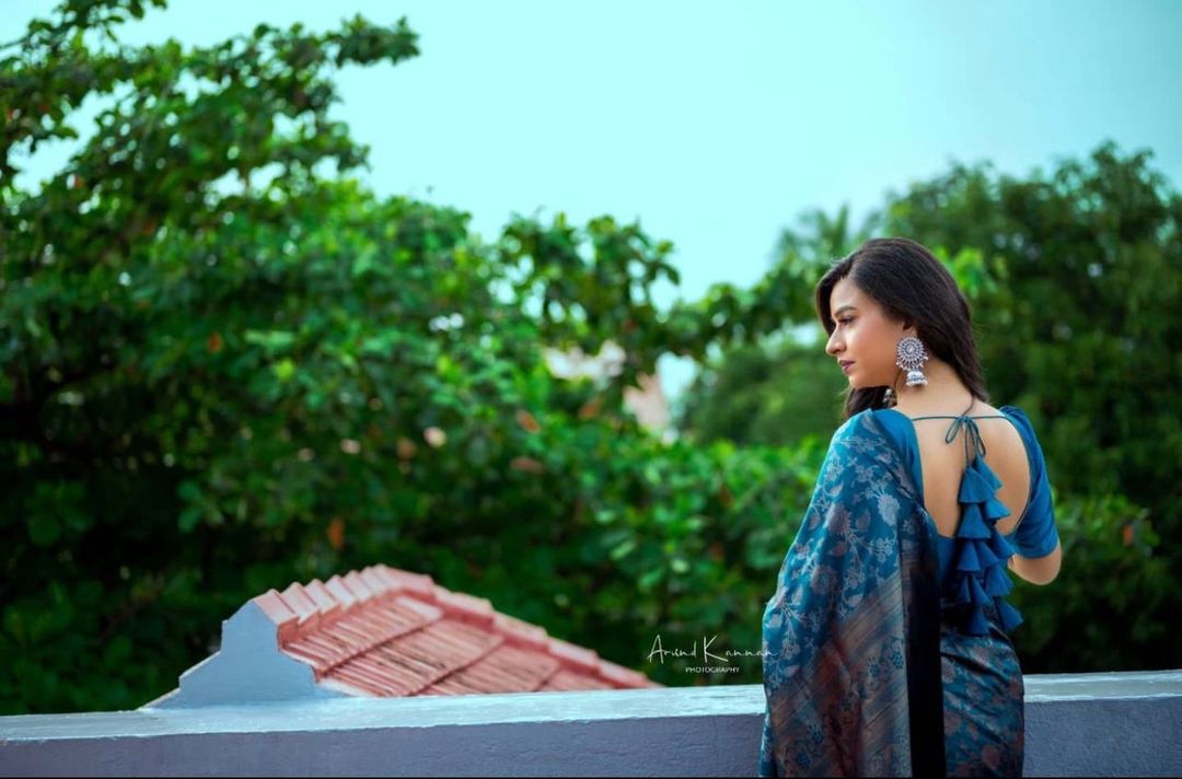 Teal Blue Banarasi Soft Silk Saree with Floral Motifs