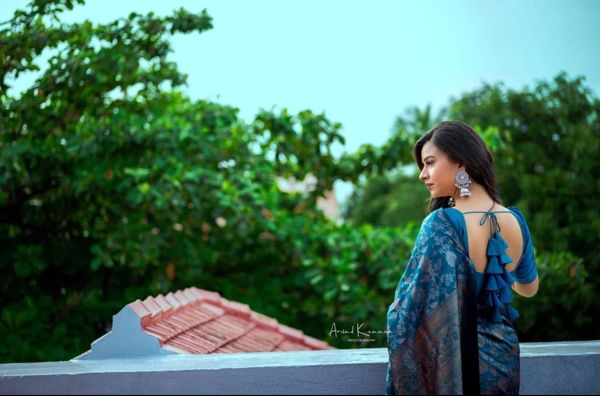 Teal Blue Banarasi Soft Silk Saree with Floral Motifs