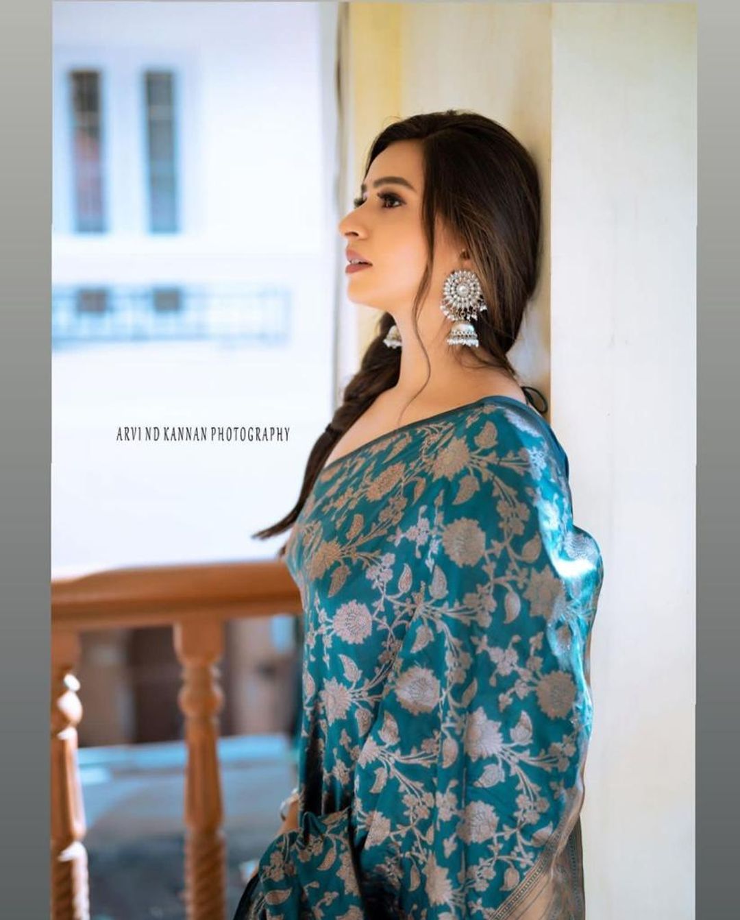 Teal Blue Banarasi Soft Silk Saree with Floral Motifs