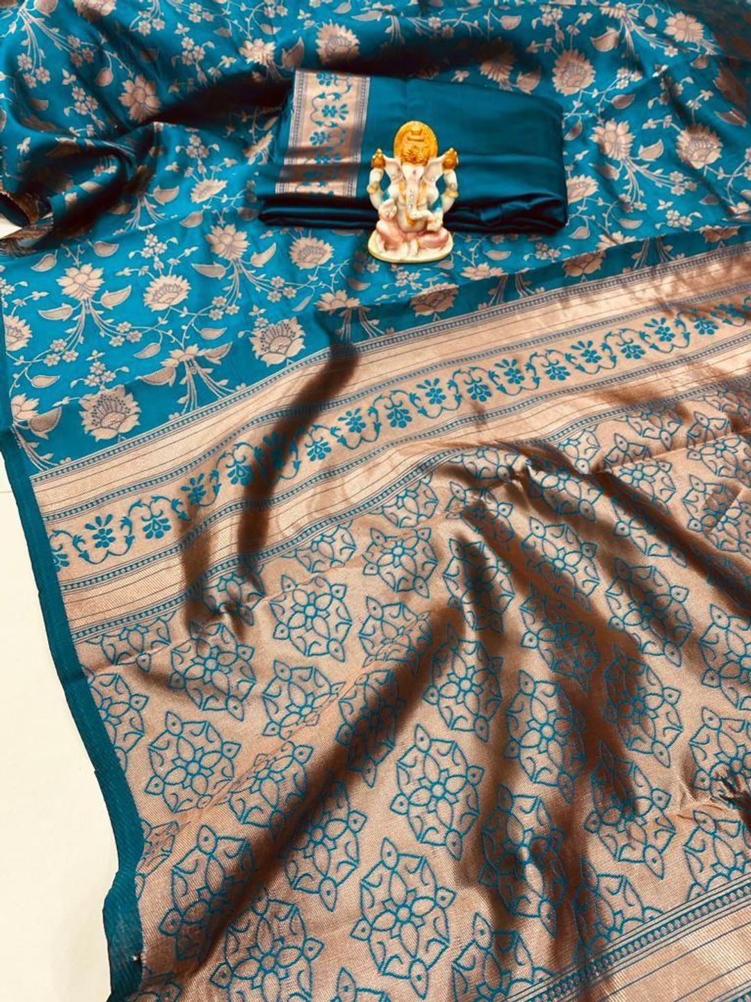 Teal Blue Banarasi Soft Silk Saree with Floral Motifs