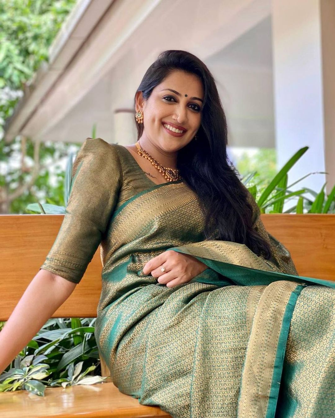 Dark Bottle Green Banarasi Soft Silk Saree with Gold Zari