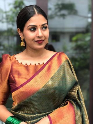 Emerald Green Banarasi Soft Silk Saree with Copper Gold Border