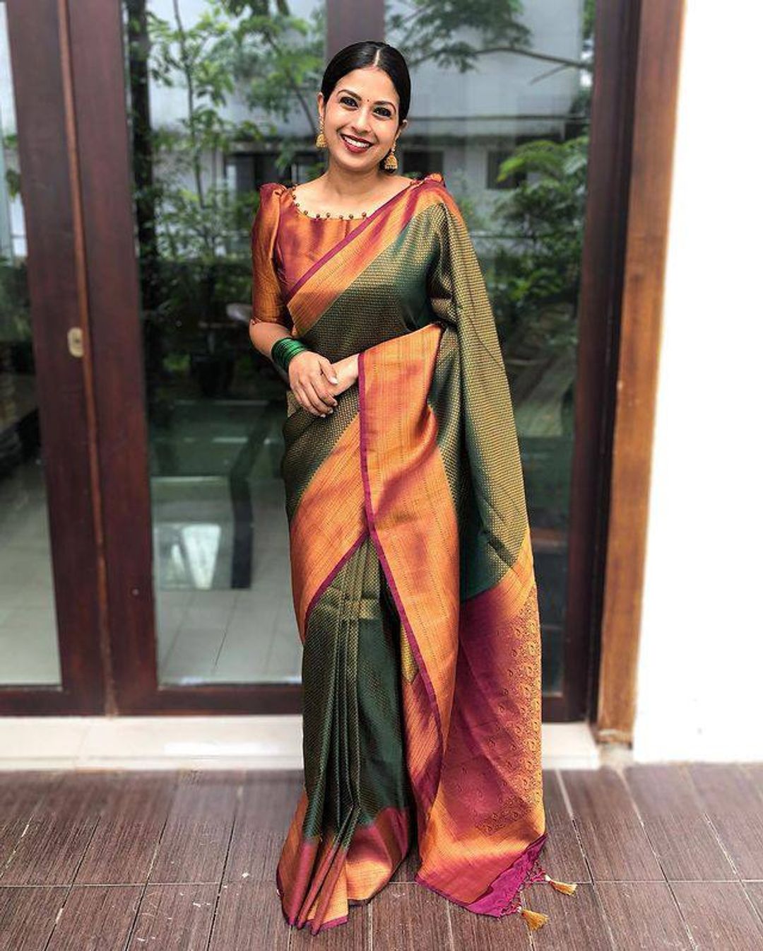 Emerald Green Banarasi Soft Silk Saree with Copper Gold Border