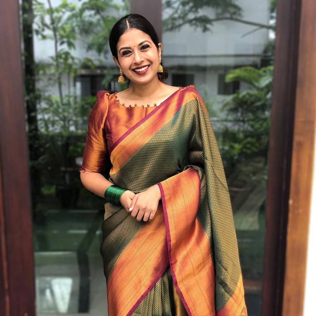 Emerald Green Banarasi Soft Silk Saree with Copper Gold Border
