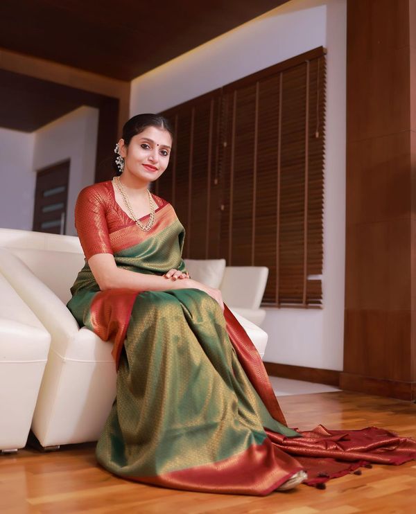 Emerald Green Banarasi Soft Silk Saree with Copper Gold Border